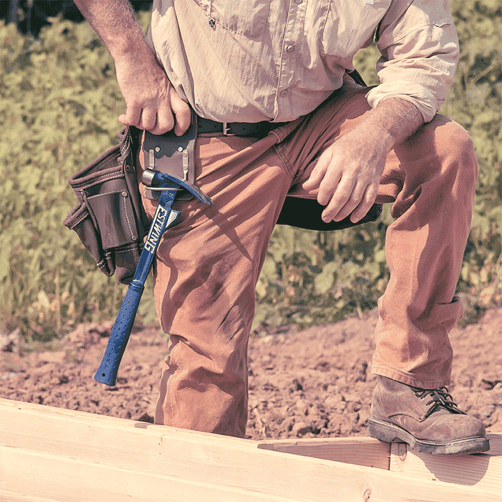 Man framing deck with Estwing Hammertooth® Hammer.