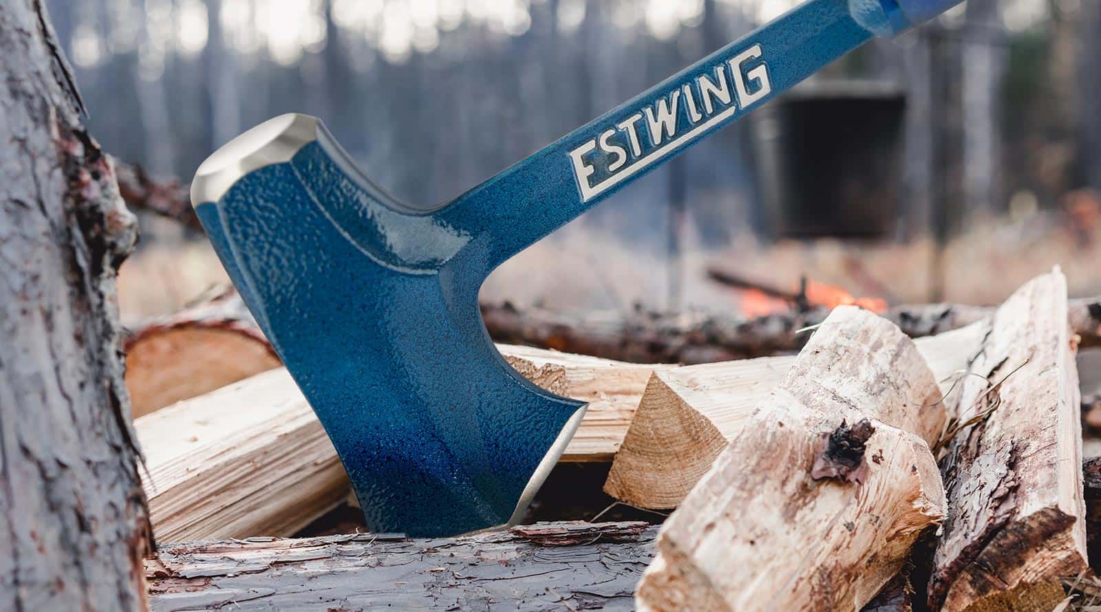 New Estwing Timber Titan™ Splitting Tool resting on split logs.